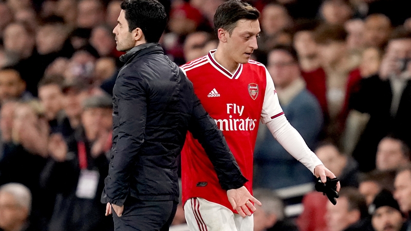 Mesut Ozil (R) has fallen out of favour under Mikel Arteta