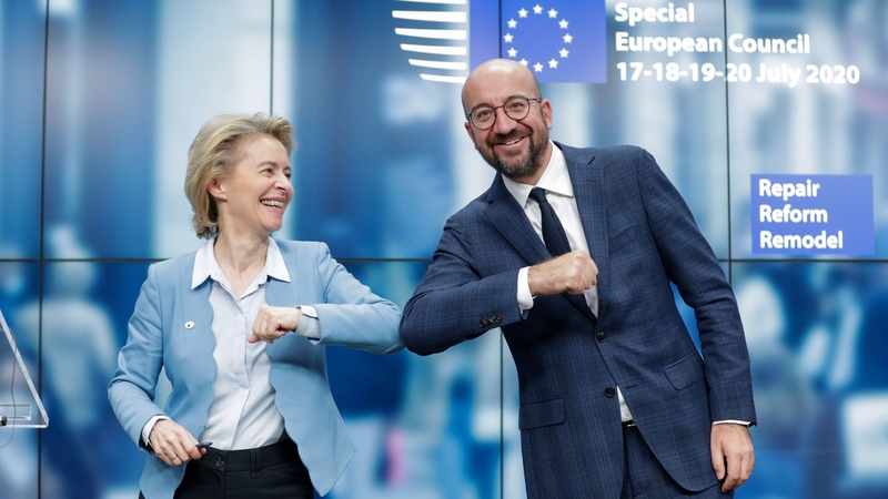 Ursula Von Der Leyen and Charles Michel bump elbows following the summit