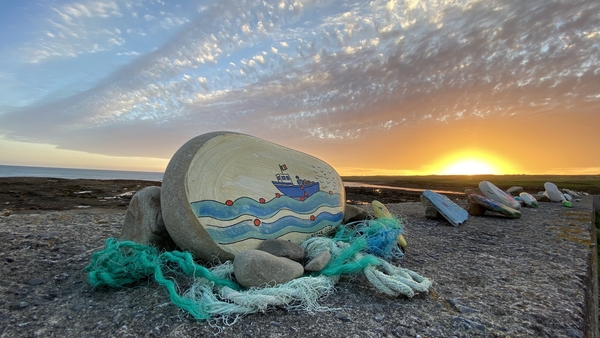 Hundreds of painted stones have been placed along the sea wall at Clahane in Liscannor.