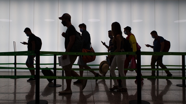 Travellers walk through Terminal 2 of the Josep Tarradellas Barcelona-El Prat Airport today