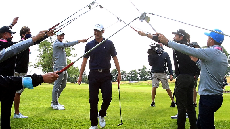 A guard of honour for the champion Renato Paratore as he strode off the 18th green