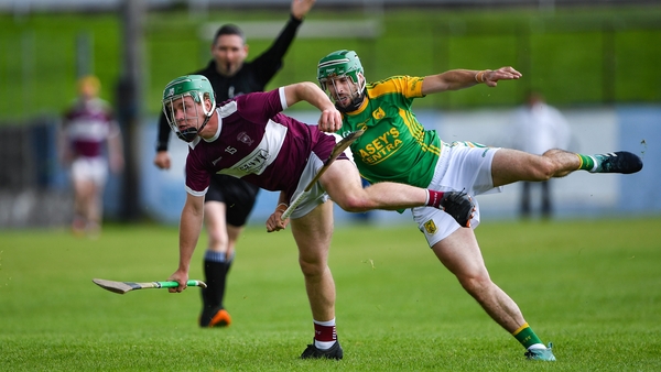 James Devaney of Borris-Ileigh tries to get away from Toomevara's Joey McLoughney
