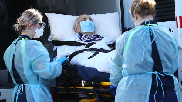 A resident of Epping Gardens nursing home is transferred to a waiting ambulance