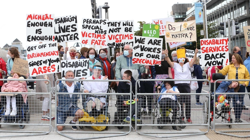 The Enough is Enough disability campaign gathered outside the Dáil today to protest at the uncertainty surrounding the return of adult day services