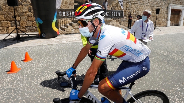 Alejandro Valverde of Movistar wears a mask before the second stage