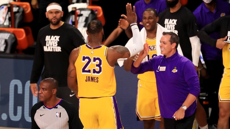 LeBron James celebrates victory with head coach Frank Vogel