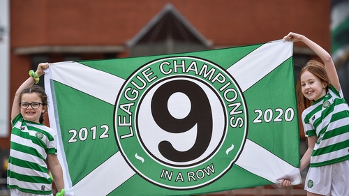 Celtic supporters celebrating their ninth league title on the bounce