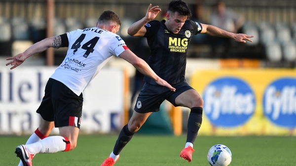 Dan Ward of St Patrick's Athletic in action against Andy Boyle of Dundalk