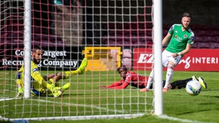 Andre Wright of Bohemians scores his side's first goal past Cork City goalkeeper Mark McNulty