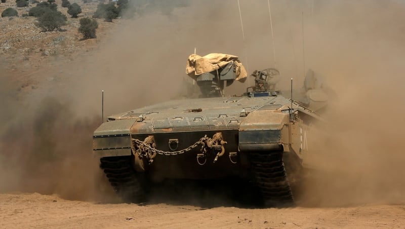 An Israeli army vehicle today in the Golan Heights, near the border with Syria