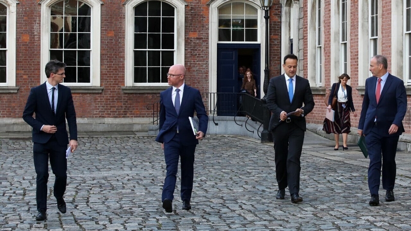 Ronan Glynn, Stephen Donnelly, Leo Varadkar and Micheál Martin pictured after the press conference (Pic: Rolling News)