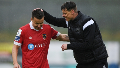 Aidan Friel of Shelbourne celebrates with his manager at the end of the game