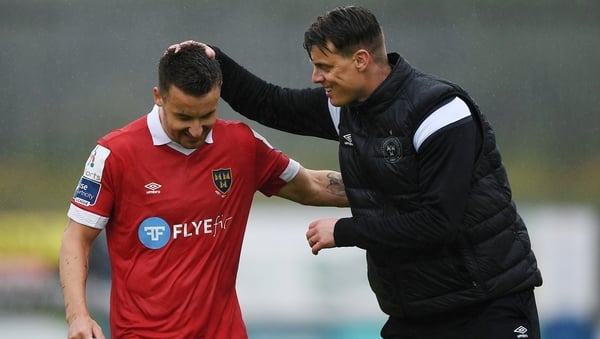 Aidan Friel of Shelbourne celebrates with his manager at the end of the game