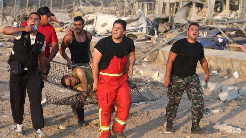 Lebanese rescue workers dig through rubble looking for survivors of the powerful blast that shook the capital Beirut