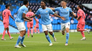 Raheem Sterling celebrates City's early goal