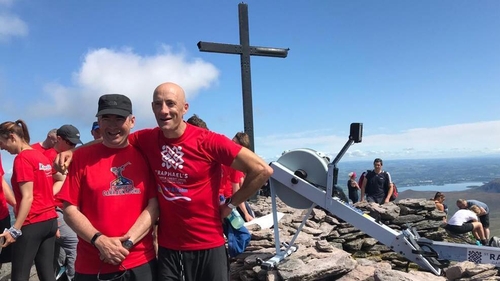 Ken McDonald (R) at the top of Carrauntoohil with Garda Commissioner Drew Harris
