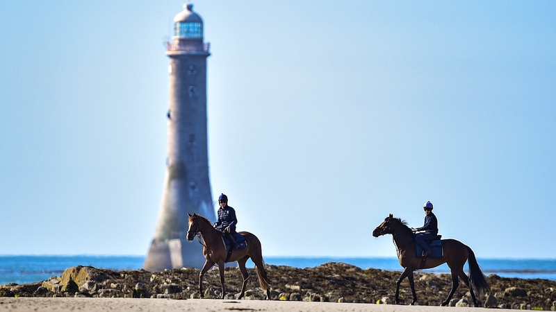 Leanne Breen on La Novia and Aili Leah on Lottieloveheart during morning work on the beach in Greencastle