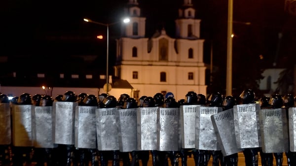 Riot police line up in Minsk after polls closed in Belarus' presidential election