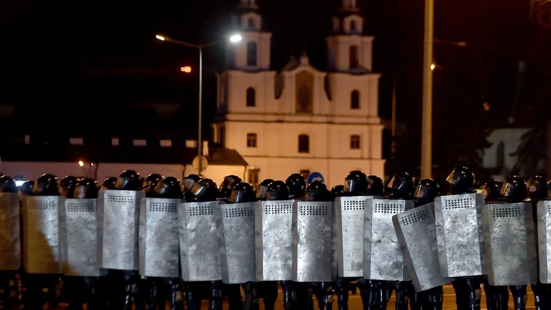 Riot police line up in Minsk after polls closed in Belarus' presidential election