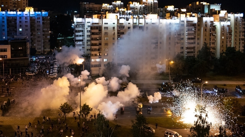 Protesters and riot police clash in Minsk during a protest against Belarus President Alexander Lukashenko's claim of victory