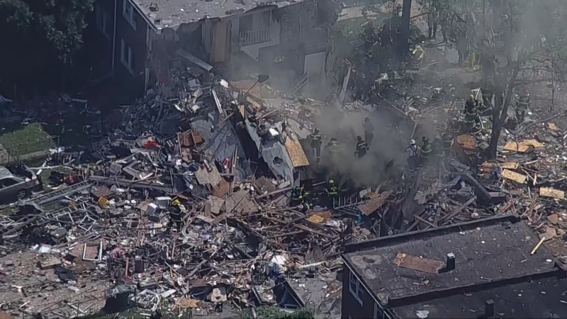 At least five others including children were trapped in the rubble