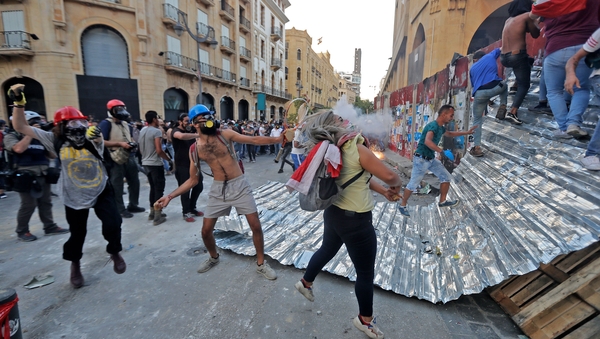 Lebanese protesters clash with security forces near parliament in central Beirut today