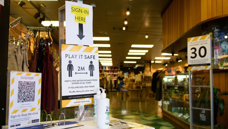 An entrance to a coffee shop with new restrictions in the city of Wellington