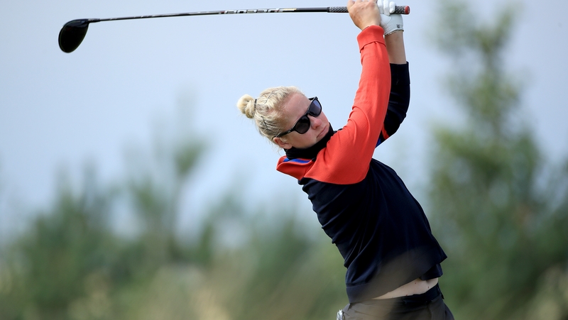 Nicole Larsen plays her tee shot on the 10th hole