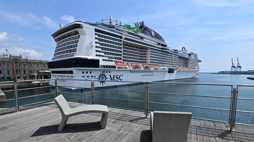 The MSC Grandiosa cruise liner preparing to leave Genoa, Italy, after six-and-half months of inactivity