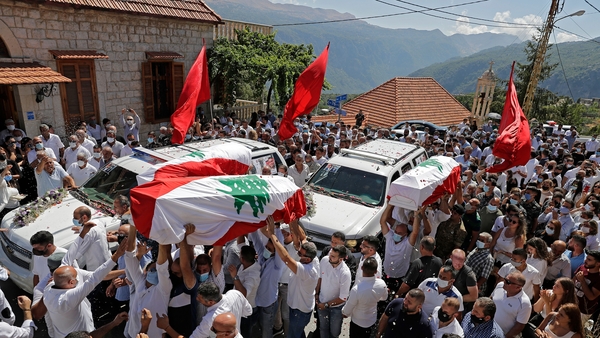 Funerals are held for the victims of the Beirut blast as Covid cases spike