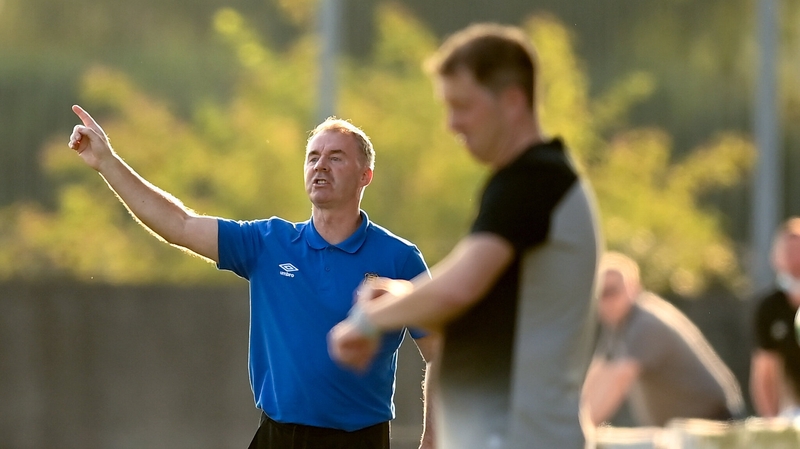 Waterford manager John Sheridan gives orders to his charges, with Vinny Perth in the foreground