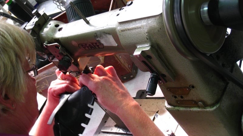 A sewing machine at Whelan Footwear