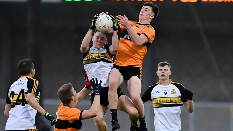Michael O'Gara of Austin Stacks rises with Dr Crokes' Michael Potts