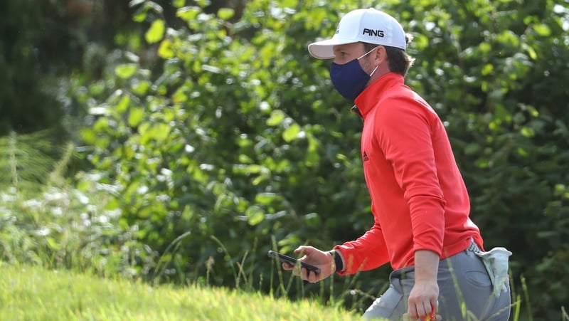 Connor Syme walks off the 18th