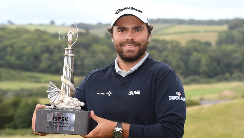 Romain Langasque poses with the trophy