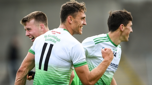 Chris Crummey of Lucan Sarsfields, centre, celebrates with Daire Newcombe, left, and Paul Crummey