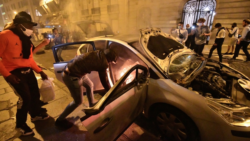 PSG fans clashed with police outside the Parc de Princes