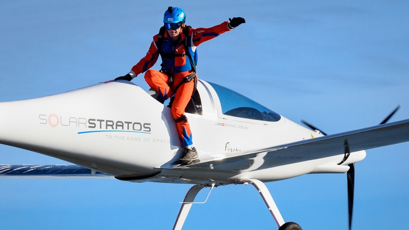 A parachutist has completed the world's first jump from a solar-powered aircraft (Pics: Getty/EPA)