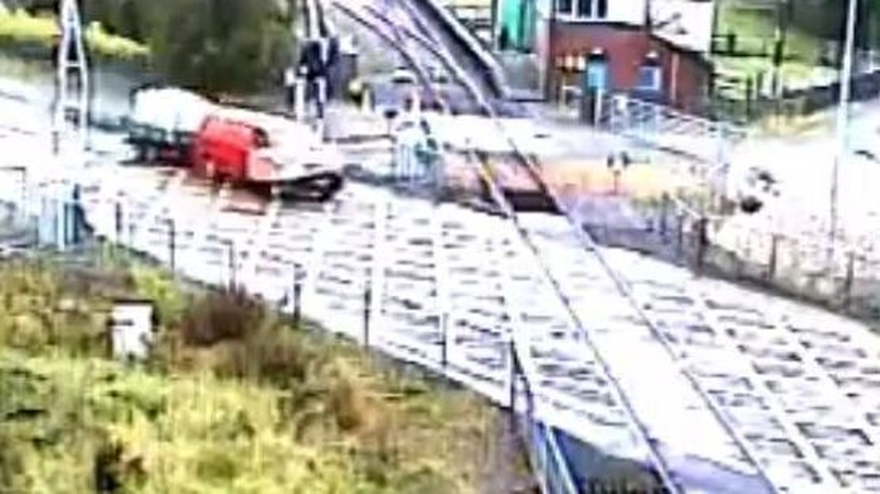 Footage shows the van crashing through the barrier