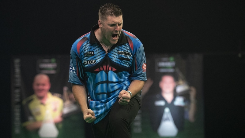 Daryl Gurney recorded a 7-5 win over Nathan Aspinall