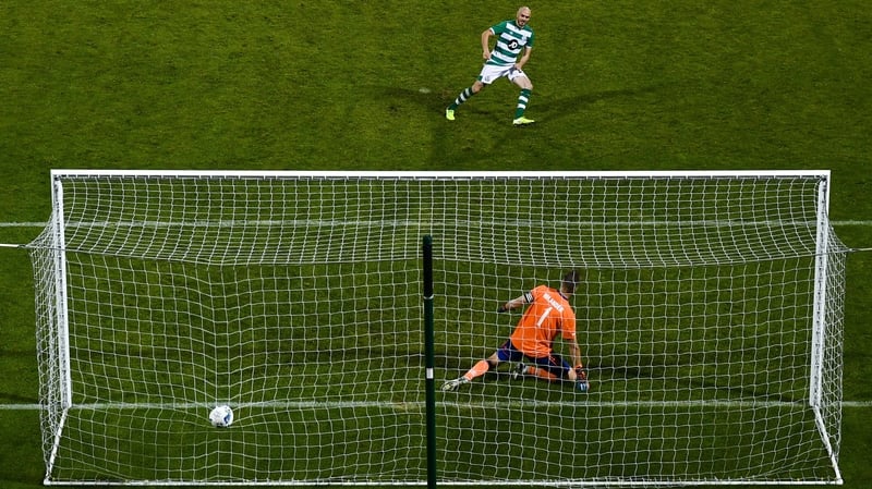 Joey O'Brien can afford a smile after beating Mika Hilander in the Ilves goal