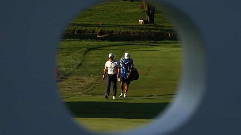 McIlroy is three off the lead