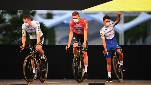 Ireland's Sam Bennett (L) with Team Deceuninck - Quick-Step team-mates Kasper Asgreen (C) and Julian Alaphilippe