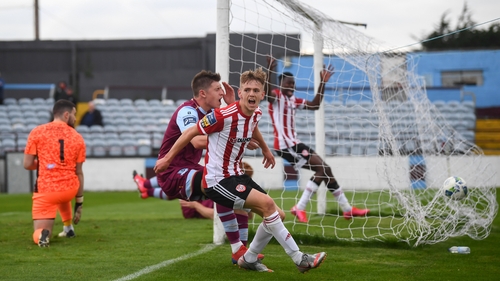 Ciaron Harkin wheels around after scoring the opening goal on 89 minutes