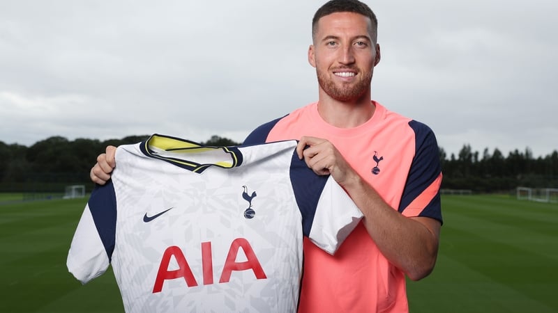Doherty poses with the Tottenham shirt