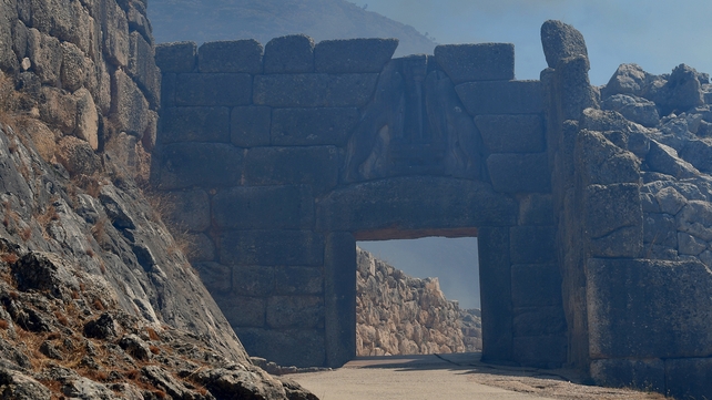 Smoke covered the famed Lion's Gate entrance to Mycenae as the fire blazed through a section of the historic site