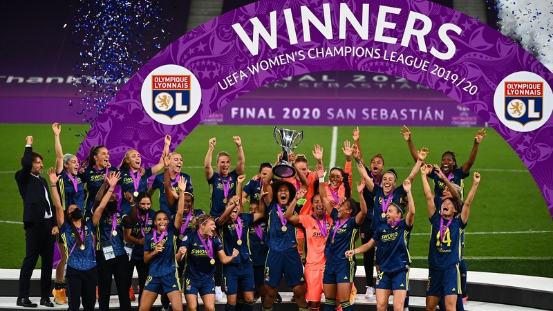 Lyon delight as the trophy is held aloft