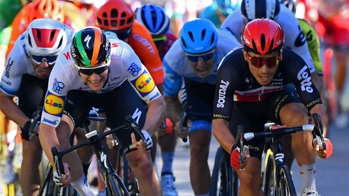 Bennett (L) is beaten on the line by Ewan