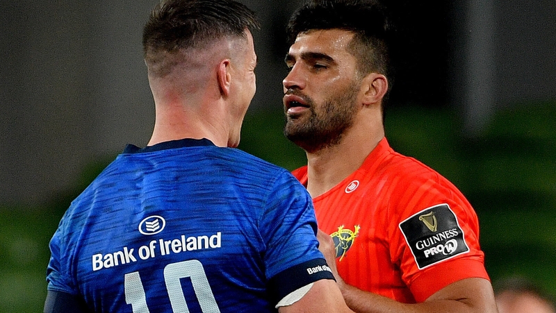 Damian de Allende (R) gets to know Johnny Sexton during the recent derby encounter