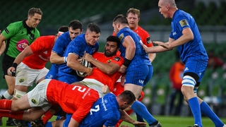 Jonathan Sexton of Leinster wins a turnover from Damian de Allende of Munster